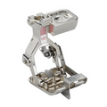 Metal sewing machine foot on a white background