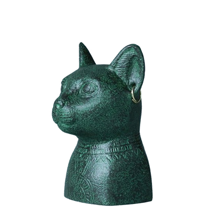 Green cat-shaped sculpture on a white background
