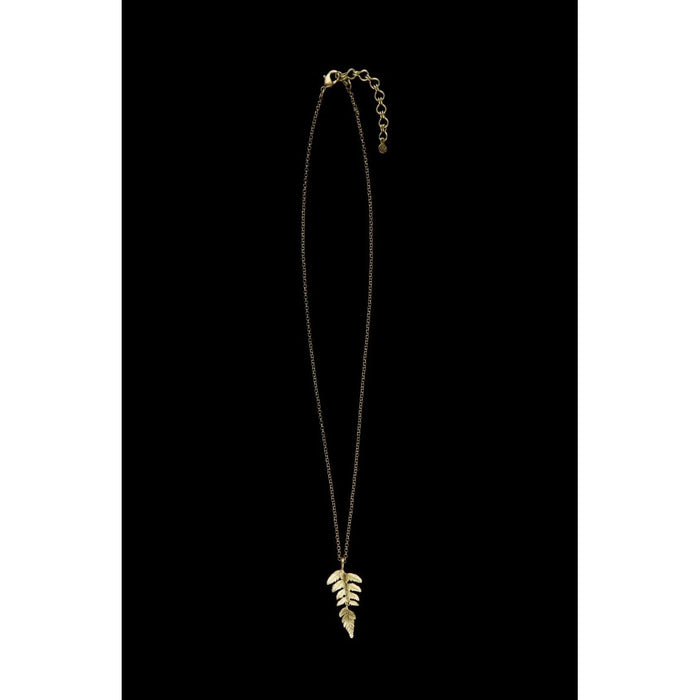 Leaf pendant necklace on a black background
