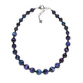Necklace with purple beads on a white background