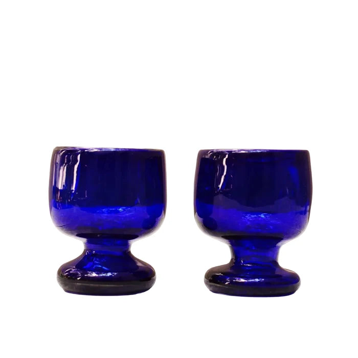 Two blue glass goblets