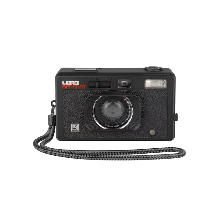 Black camera with a strap on a white background