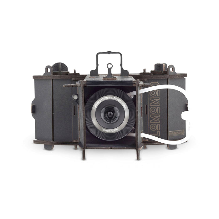 Vintage-style camera with 'Lomography' branding on a white background