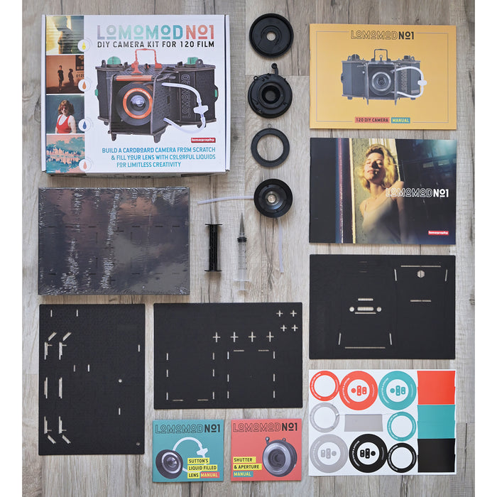 LEMO MOD NO1 DIY camera kit components on a wooden surface