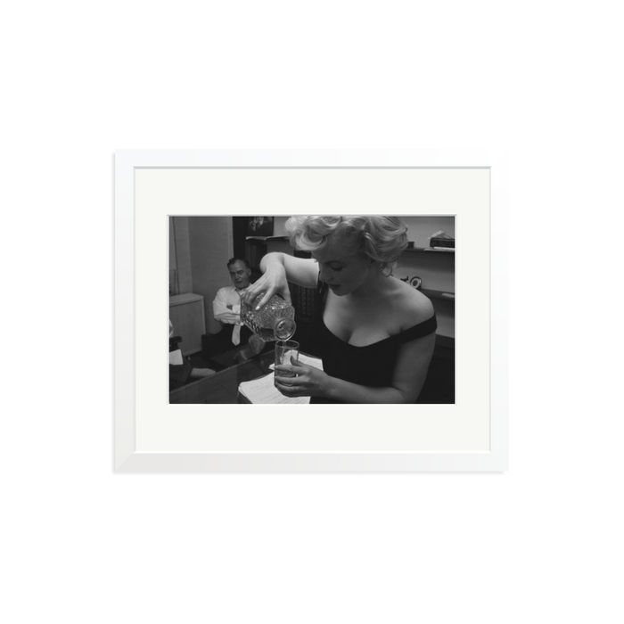 Marilyn Monroe Pouring A Drink Framed Print White Medium