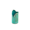 Turquoise ceramic vase with wavy edge on a white background
