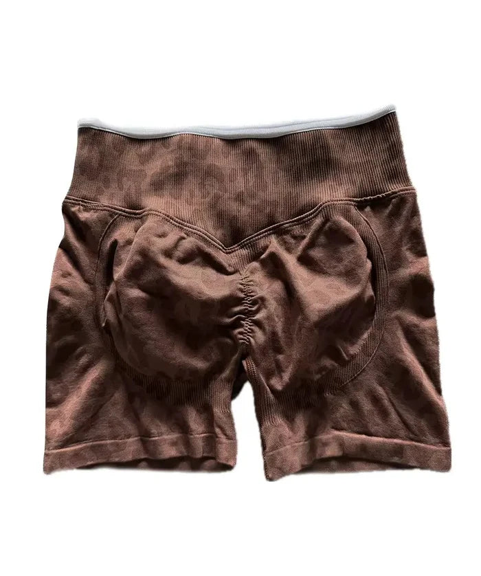 Stretchy women's seamless yoga shorts - high-waist hip-lifting, nylon blend, for gym and running